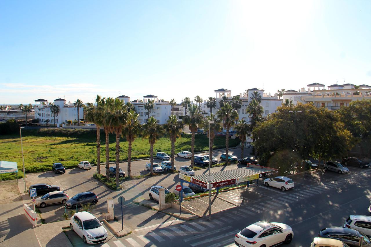 Akilar 1678219883SJKATP ref 1801 mobile 12 Views from the balcony Villamartin Plaza
