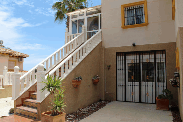 Akilar 1591917851KBDQSH ref 1760 mobile 2 Front entrance of the Villamartin Villa Pinada Golf