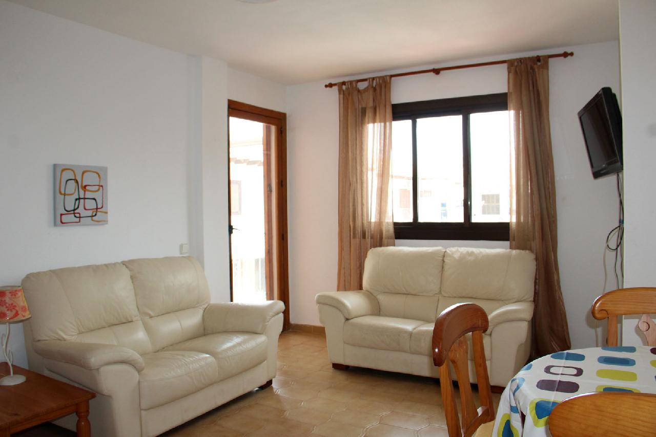 Akilar 1669821558QLCPVR ref 1795 mobile 3 Spacious living room and TV Villamartin Plaza