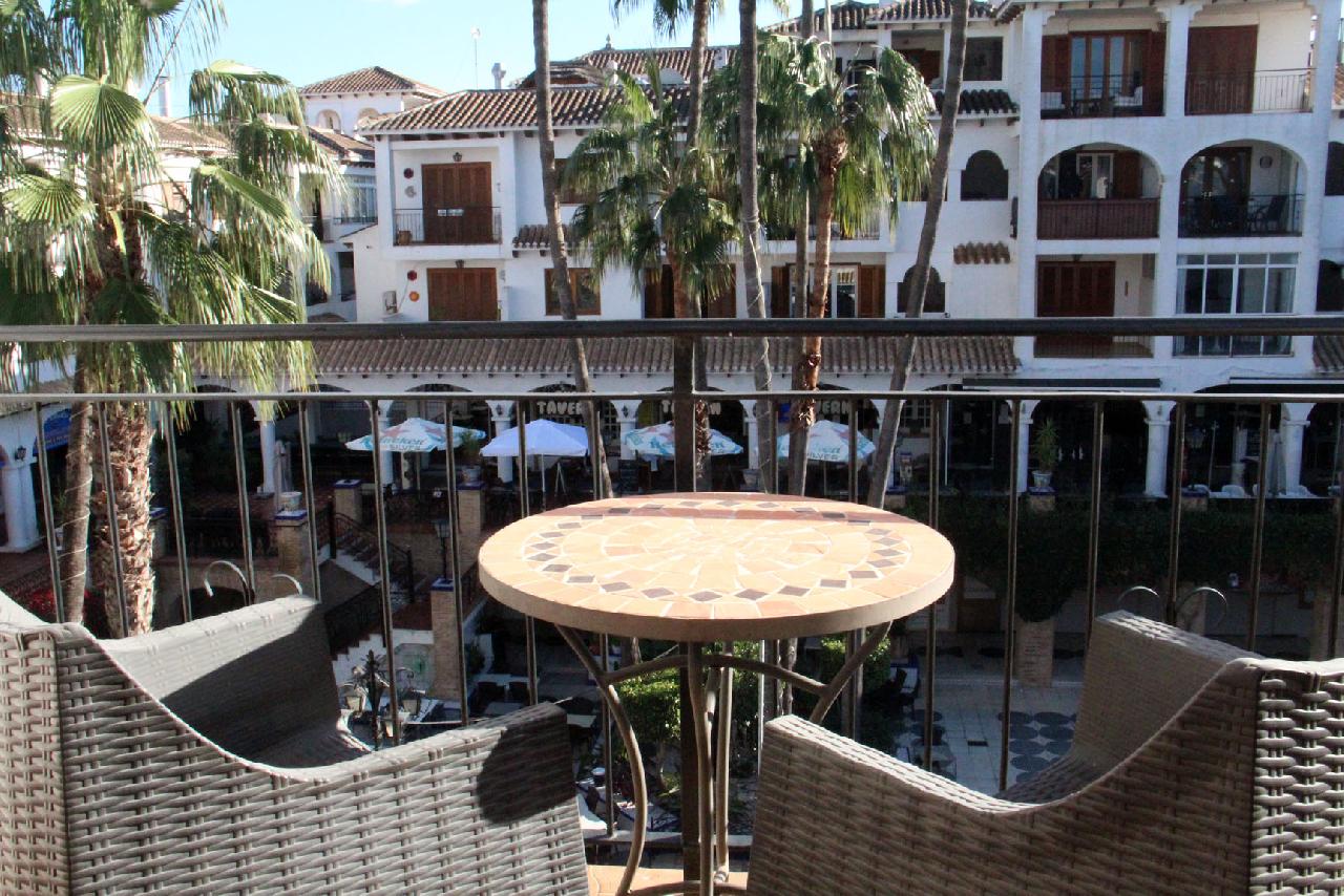 Akilar 1701083865PNXCGM ref 1815 mobile 1 South facing balcony into the Plaza Villamartin Plaza
