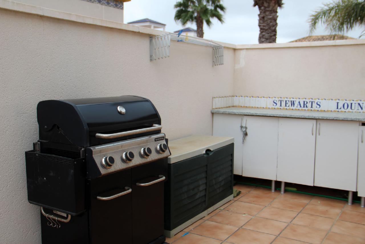 Akilar 1646607966YJRPIU ref 1781 mobile 4 BBQ on the solarium Villamartin